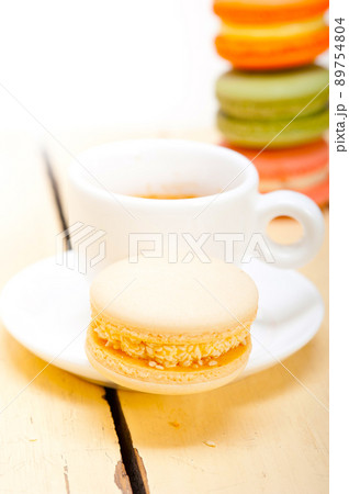 colorful macaroons with espresso coffee colorful macaroons with espresso coffee 89754804