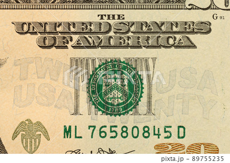 Macro shot with part of 20 US dollars bill. Twenty dollars banknote close up photo with high resolution. Money earnings, payday or tax paying period 89755235