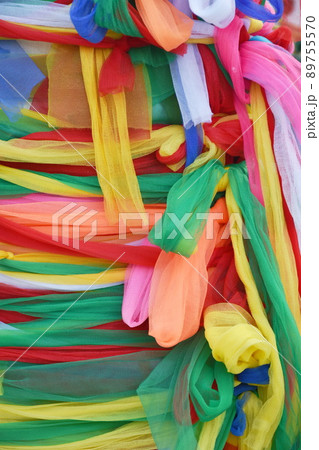 colorful cloth roll over blackjack of giant statue at temple of dawn travel location in Thailand colorful cloth roll over blackjack of giant statue at temple of dawn travel location in Thailand 89755570