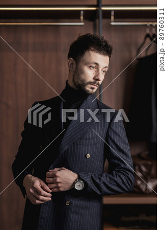 portrait of a thoughtful man in a suit portrait of a thoughtful man in a suit 89760311