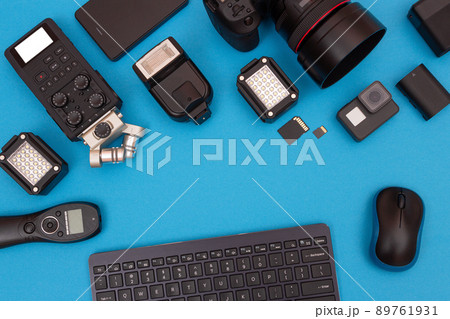 Workplace With Digital Gadgets on Blue Table Workplace With Digital Gadgets on Blue Table 89761931