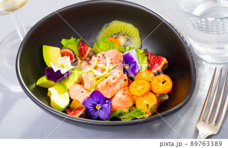 Salmon ceviche with avocado, kumquat, figs, kiwi fruit Salmon ceviche with avocado, kumquat, figs, kiwi fruit 89763389