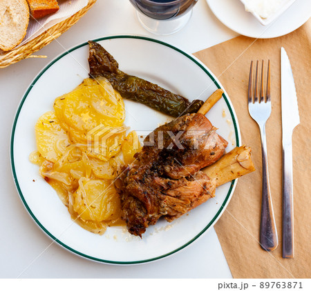 Delicious pork knuckle with potatoes 89763871