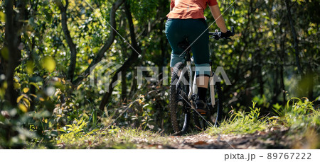 Mountain biking in spring forest 89767222