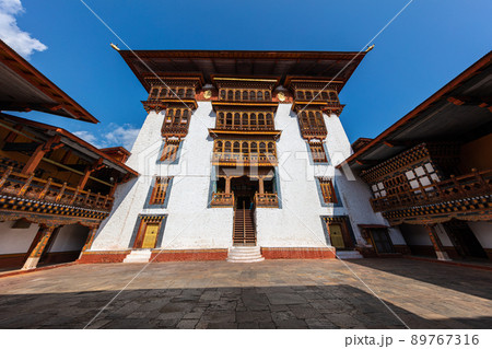 Bhutan - October 24, 2021: Inside  Punakha Dzong in Bhutan. Punakha Dzong Monastery, one of the largest monasteries in Asia. The delicate decoration inside of punakha dzong, Bhutan. traditional facade 89767316