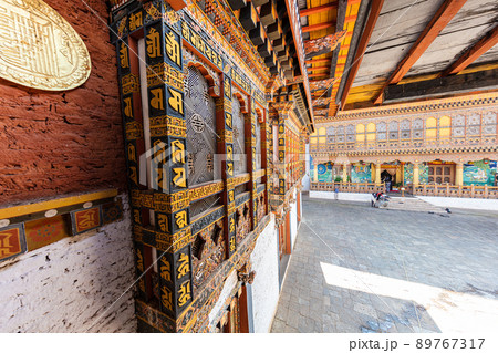 Bhutan - October 24, 2021: Inside  Punakha Dzong in Bhutan. Punakha Dzong Monastery, one of the largest monasteries in Asia. The delicate decoration inside of punakha dzong, Bhutan. traditional facade 89767317