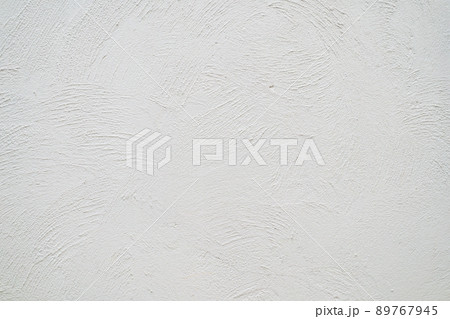 Loft-style plaster walls, gray, white, empty space used as wallpaper. Popular in home design or interior design. with copy spaces. Loft-style plaster walls, gray, white, empty space used as wallpaper. Popular in home design or interior design. with copy spaces. 89767945