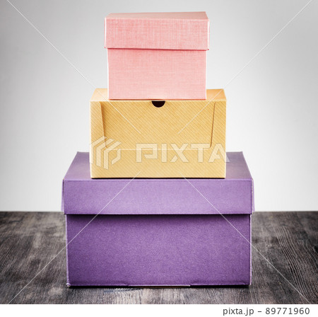 Colorful package box on a table Colorful package box on a table 89771960