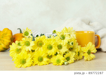 Autumn composition with chrysanthemums on wooden table 89772287