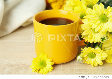 Autumn composition with chrysanthemums on wooden table 89772289