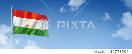 Tajikistan flag isolated on a blue sky. Horizontal banner 89773502