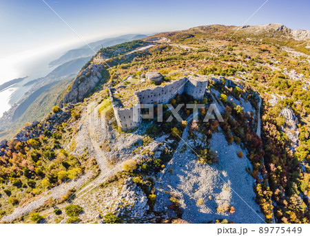 Collapsing tower of fortress Kosmac. Ancient Austro-Hungarian fortress built as a defensive structure and an observation post. Montenego 89775449
