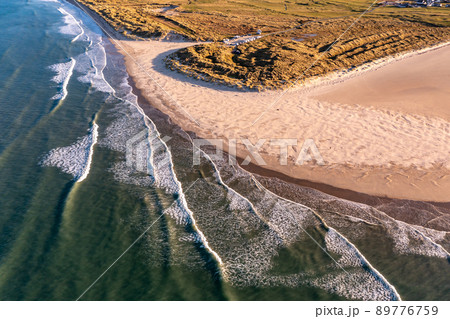 Aerial of the Beautiful Blue Flag Beach, Killahoey Strand near Dunfanaghy, Donegal, Ireland Aerial of the Beautiful Blue Flag Beach, Killahoey Strand near Dunfanaghy, Donegal, Ireland 89776759