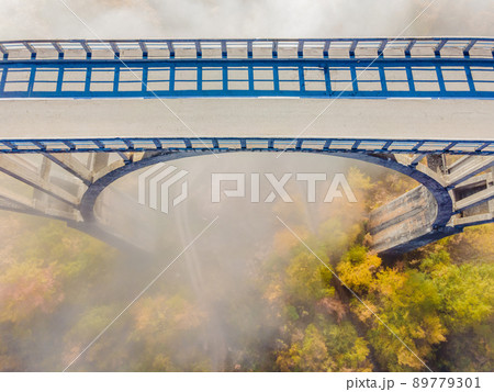 Montenegro. Dzhurdzhevich Bridge Over The River Tara foggy morning 89779301