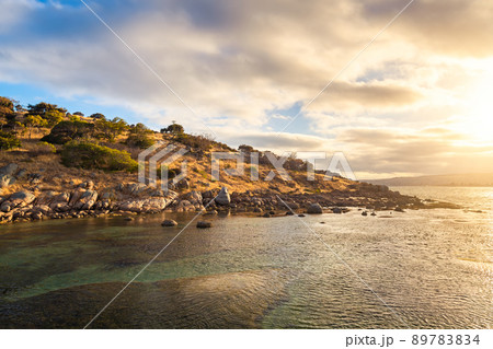 Granite Island at sunset viewed from the causeway, South Australia Granite Island at sunset viewed from the causeway, South Australia 89783834