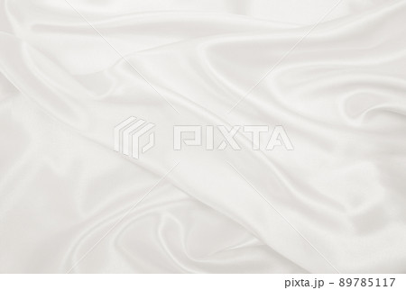 Smooth elegant golden silk or satin luxury cloth texture as wedding background. Luxurious background design. In Sepia toned. Retro style 89785117
