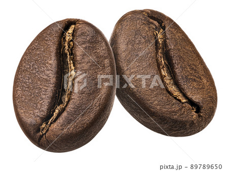 Two roasted coffee beans isolated on white background Two roasted coffee beans isolated on white background 89789650