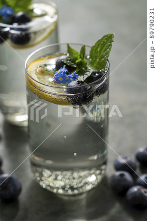 Detox water, infused refreshing drink with lemon and blueberry and mint. Detox water, infused refreshing drink with lemon and blueberry and mint. 89790231