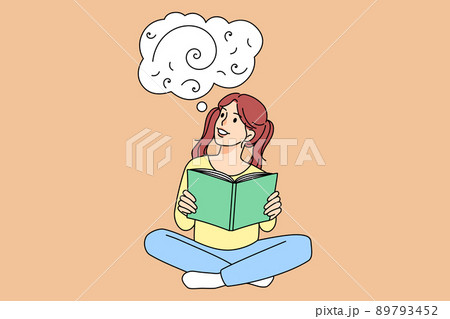 Smiling girl child read book imagining Smiling girl child read book imagining 89793452