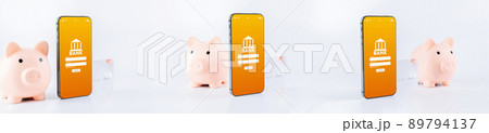 E banking concept. Mobile phone set with internet online bank app. Pig bank with credit card on white background. Online wallet collection save money. E banking concept. Mobile phone set with internet online bank app. Pig bank with credit card on white background. Online wallet collection save money. 89794137