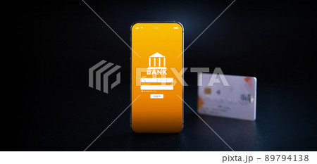 E banking concept. Mobile phone with internet online bank app. Credit card on black background. Online wallet save money. E banking concept. Mobile phone with internet online bank app. Credit card on black background. Online wallet save money. 89794138