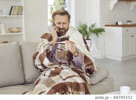 Sick man struggle with covid-19 consult with doctor on phone 89795552