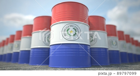 Flag of Paraguay on the barrels or steel drums. Chemical or oil industry related 3D rendering Flag of Paraguay on the barrels or steel drums. Chemical or oil industry related 3D rendering 89797099