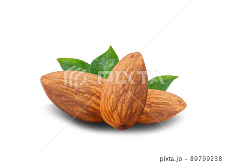 almonds with green leaves isolated on white background 89799238