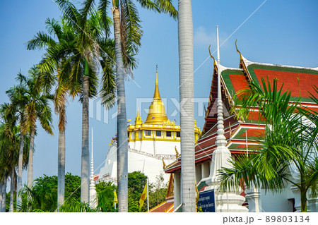 Wat SaKad & Golden mountain from the entrance view. Thai letter in the sign board is "Buddhist Temple" and another one is "Join the Buddhism Event in the Buddha day at Buddhist Temple" Wat SaKad & Golden mountain from the entrance view. Thai letter in the sign board is "Buddhist Temple" and another one is "Join the Buddhism Event in the Buddha day at Buddhist Temple" 89803134