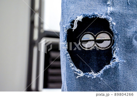 Arts and decoration blue jean by paint pull thread in department store Thailand. 89804266