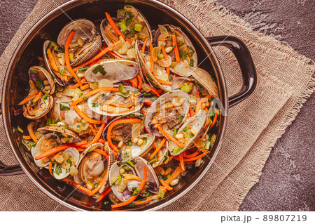 Shells vongole venus clams with vegetables and herbs Shells vongole venus clams with vegetables and herbs 89807219