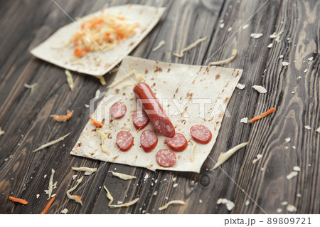 preparation of Shawarma. ingredients on wooden table.photo with preparation of Shawarma. ingredients on wooden table.photo with 89809721