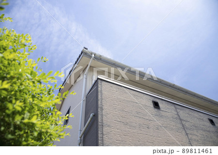 外壁のサイディングが劣化して色あせている 89811461