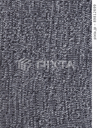 Texture of knitted black and white fabric. Texture of knitted black and white fabric. 89812699