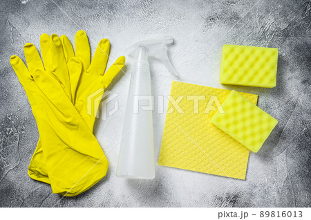 Bathroom and toilet yellow cleaning concept, housecleaning, hygiene, spring, chores, cleaning supplies. White background. Top view Bathroom and toilet yellow cleaning concept, housecleaning, hygiene, spring, chores, cleaning supplies. White background. Top view 89816013