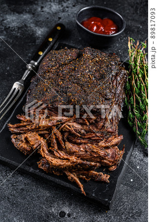 Texas Style BBQ Smoked Beef Brisket meat steak. Black background. Top view Texas Style BBQ Smoked Beef Brisket meat steak. Black background. Top view 89817093