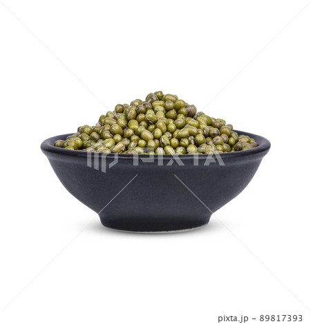 Mung bean seeds in a black cup isolated on white background Mung bean seeds in a black cup isolated on white background 89817393