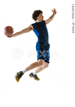 Dynamic portrait of young man, basketball player playing basketball isolated on white background. Concept of sport, movement, energy and action 89818061