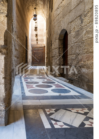 Vaulted passage leading to the Courtyard of Sultan Qalawun mosque with colorful marble floor, Cairo 89820895