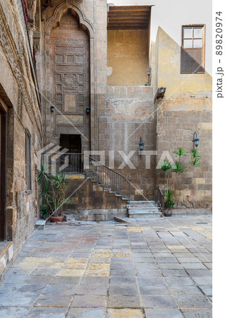 Courtyard of Prince Tax palace with staircase and entrance leading to the first floor Courtyard of Prince Tax palace with staircase and entrance leading to the first floor 89820974