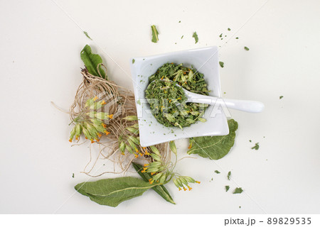 Dried cowslip, Primula veris, for healthy herbal tea, top view. 89829535