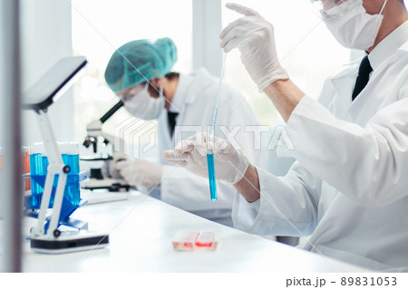 background image scientists are conducting research in the laboratory. 89831053
