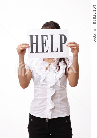 closeup. business woman showing poster with the word help. 89832198