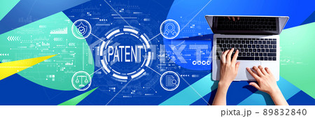 Patent concept with person using a laptop Patent concept with person using a laptop 89832840