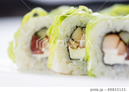 Japanese food restaurant, sushi maki gunkan roll plate or platter set. Sushi set and composition Japanese food restaurant, sushi maki gunkan roll plate or platter set. Sushi set and composition 89833133