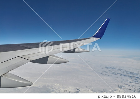 Flying on a plane Flying on a plane 89834816