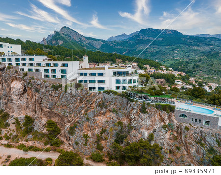 Aerial view of the luxury cliff house hotel on top of the cliff on the island of Mallorca. 89835971