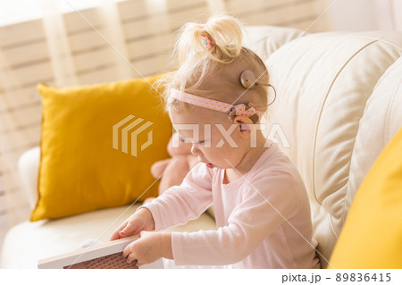 Cochlear implant for baby. Deaf child with hearing aid. Health care and medicine technology and innovations and diversity Cochlear implant for baby. Deaf child with hearing aid. Health care and medicine technology and innovations and diversity 89836415