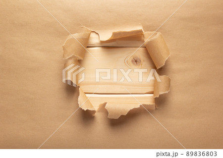 Brown package torn paper background texture 89836803