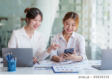 Analytics intelligence concept. Group of business people discuss current financial and economic on laptop for investment at the meeting.. 89838339